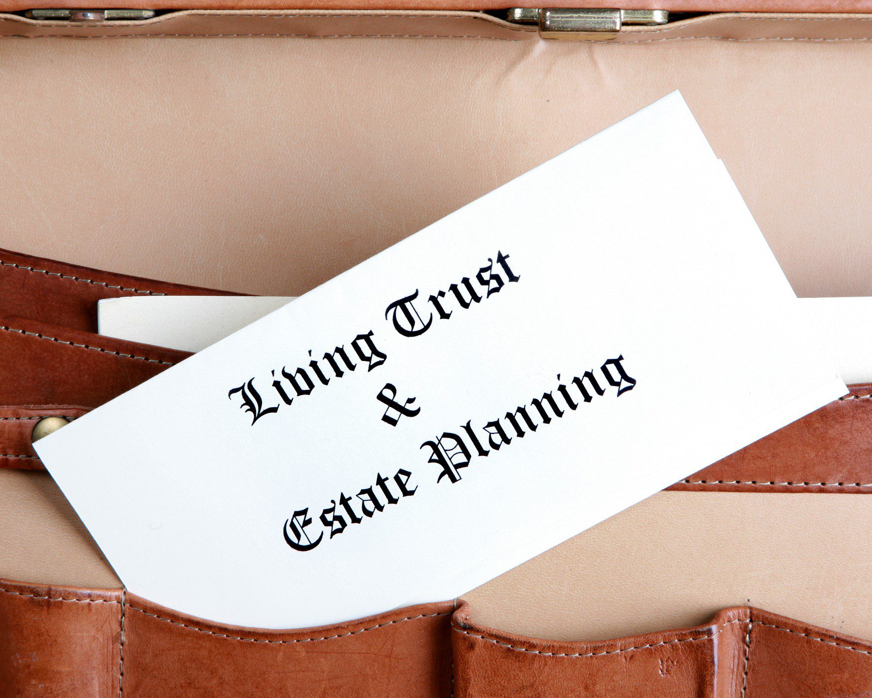 Legal documents in brown briefcase